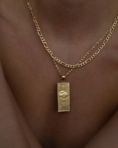 Keep it 100. This double-sided 14k gold one hundred dollar bill pendant mirrors the actual currency. Placed on our solid gold 2mm Rope Chain for a rich effect. Gold Jewelry With Coin Pendant, Gold Jewelry With Square Coin Pendant, Classic Gold Jewelry With Rectangular Pendant, 14k Gold Medallion Figaro Chain Jewelry, Gold Chains Aesthetic, 100 Dollar Bill Aesthetic, Gold Jewelry For Streetwear, Luxury Gold Chain Necklace With Coin Pendant, Gold Engraved Rectangular Pendant Jewelry