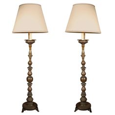 a pair of lamps sitting next to each other