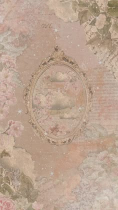 an ornate wallpaper with pink flowers and gold trimmings on the bottom half of it