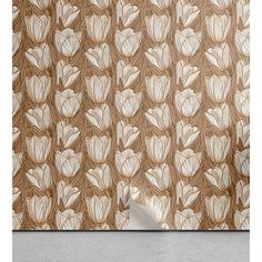 an abstract floral wallpaper with white flowers on brown and beige background, in the corner of a room