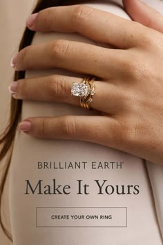 a woman's hand with a ring on her finger and the words brilliant earth make it yours create your own ring