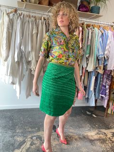 Dosa Green Silk Wrap Skirt. A fun and bright knee-length skirt in a grass green textured silk. Gives a modern-luau vibe! Interior is lined in a gorgeous patchwork stitched pattern, so the skirt could potentially be worn reversible as well! Wrap ties at the waist, allowing for an adjustable fit. Marked one size, but best fits a size M/L. 100% silk, dry clean only. Made in the USA. In excellent, like-new condition. Approx. Measurements: Adjustable waist: 15" through 18" laid flat across Length: 21 Green Asymmetrical Pleated Skirt, Green Pleated Asymmetrical Skirt, Fitted Green Skirt For Spring, Summer Silk Mini Skirt, Silk Mini Skirt With Lining, Green Lined Skirt For Spring, Chic Green Tiered Mini Skirt, Green Knee-length Summer Skirt, Green Asymmetrical Skirt For Party