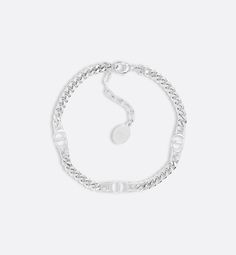 The silver bracelet showcases a modern and resolutely Dior style. The thin chain links are enhanced by openwork CD Icon signatures, paying homage to House archives. The bracelet can be coordinated with the matching necklace to complete the look.. Chain Link Bracelet Silver, Cd Icon, Mens Accessories Bracelet, Dior Style, Dior Necklace, Dior Jewelry, Silver Cufflinks, Matching Necklaces, Bracelet Silver