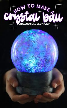 someone holding a crystal ball in their hands with the text how to make a crystal ball