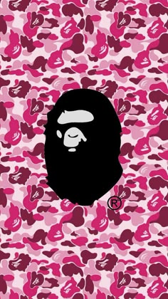 a pink and black camouflage background with a gorilla head on the bottom right hand corner