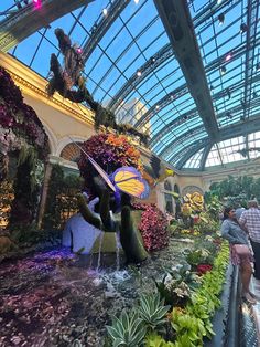 Bellagio, Las Vegas, vacation destinations, secret garden, Bellagio display, greenry, magical garden, butterfly sculpture, greenhouse, garden, flower garden, pretty aesthetic garden, mystical garden location, date ideas, hangout ideas Date Locations Aesthetic, Butterfly Garden Aesthetic, Garden Mystical, Boyfriend Activities, Las Vegas Aesthetic, Garden Exhibition, Places Photos, Butterfly Sculpture, Mystical Garden