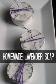 three homemade lavender soaps on a white plate