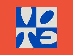 an orange and blue square with the letter e in it's center is shown