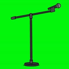 a microphone on top of a green screen