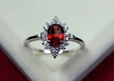 (eBay) Find many great new & used options and get the best deals for 1.50Ct Oval Cut Simulated Ruby Halo Engagement Ring 14K White Gold Plated at the best online prices at eBay! Free shipping for many products! Garnet Wedding Rings Silver, Unique Garnet Ring, Antique Garnet Ring, Red Engagement Ring, Garnet Wedding Rings, Ruby Wedding Rings, Garnet Wedding, Garnet Ring Silver, January Birthstone Rings