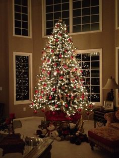 a decorated christmas tree in a living room