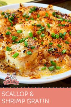 scallop and shrimp gratin in a white dish with green onions on top