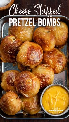 These Cheesy Pretzel Bombs are bursting with gooey cheddar cheese, wrapped in biscuit dough, boiled, and then baked to a golden brown. Sprinkled with a touch of salt, these Pretzel Bombs are a must-try for any cheese lover looking for a satisfying, homemade snack. Serve this crowd-pleasing appetizer at your next gathering or for game days. Cheese Stuffed Pretzel Bites, Cheesy Pretzels, Homemade Appetizers, Cheese Appetizers Easy, Cheesy Bread Recipe, Cheese Bites Recipe, Tailgating Food, Pretzel Bites Recipes, Pretzel Snacks