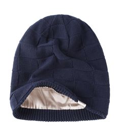 a blue knitted hat with an open hood on the front and side of it