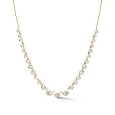 This tennis-style eternity necklace is the perfect hint of classic while firmly rooted in the present. The Vanguard Diamond Riviera Necklace combines the classic tennis silhouette with our signature Alchemy setting to bring forward a modern feel. Handcrafted in 18-karat gold and featuring 3 emerald-cut and 22 round, brilliant cut diamonds, the Vanguard Riviera Necklace is a show-stopping must-have for any jewelry collection. Combine this necklace with heavier chain pieces like the Pia and Phoebe Yellow Gold Brilliant Cut Tennis Necklace, Yellow Gold Tennis Necklace With Prong Setting, Timeless Yellow Gold Tennis Necklace With Prong Setting, Tennis Silhouette, Riviera Necklace, Eternity Necklace, Tennis Style, Bespoke Engagement Ring, Heavy Chain