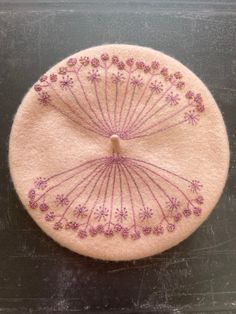 Pale pink woolmark beret hat that has been lovingly hand embroidered with an abstracted design of Cow Parsleys flowers in tones of soft mauve purples and deep pinks. A really pretty striking design perfect for spring! This is a unique piece of wearable art that will look striking and stylish while also keep you warm in the colder months. Made from 100% wool.  The beret has a circumference of 20 inches, this will comfortable fit an average head size of 22 inches. Love this design but would prefer Feminine Vintage Style, Vintage Style Hat, Rose Pale, Beret Hat, Pale Pink, Hat Fashion, Style Vintage, Wearable Art, Hand Embroidered