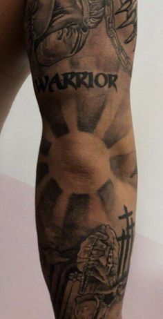 a man's arm with tattoos on it and the word warrior written in black ink