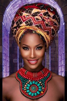 an african woman wearing a colorful head piece