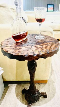 a table with two wine glasses on it