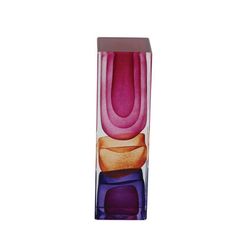 a tall glass vase with an abstract design on the front and sides, in purple, pink, orange and yellow colors