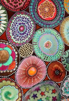 an art work with many different colors and designs on it, including circles in the center