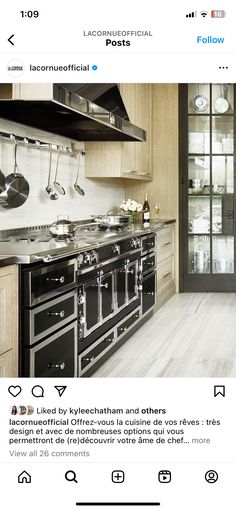 an instagramted photo of a kitchen with wooden cabinets and stainless steel stoves