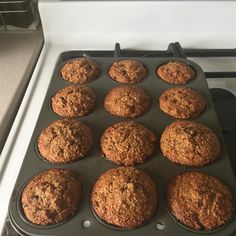 muffins are sitting in a pan on the stove