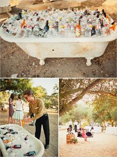 an old bathtub filled with lots of bottles and people standing in the back ground