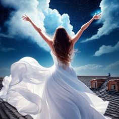 a woman in a white dress standing on top of a roof with her arms outstretched