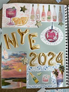 an open notebook with the words new year's written in gold foil