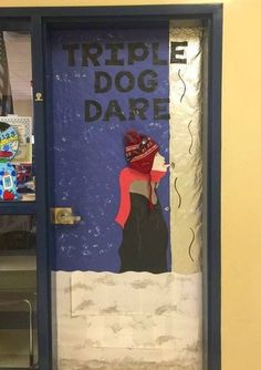 a door with the words triple dog dare painted on it, and an image of a woman's head