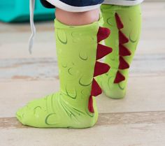 Wow Factor to the max Cosplay, fun and functional - with the seam in the back! We are well known for our socks - from no show to footed tights and everything in between. Now we are introducing you to our newest gem - socks with the seam in the back! Create one of a kind socks sure to bring a smile to your little one's face! Or colorblock a leg eating shark/fish with teeth and fin! There are also spikes for a dinosaur or dragon and last but not least the stripes options: overknee and knee high, o Fish With Teeth, Fun Socks For Kids, Dinosaur Socks, Shark Fish, How To Stretch Shoes, Shark Fishing, A Dinosaur, Crazy Socks, Sock Patterns