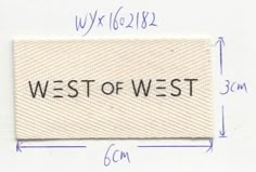 a piece of cloth with the words west of west printed on it, and measurements