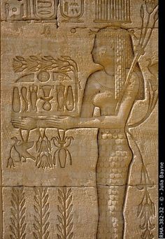 an ancient egyptian relief depicting the god and goddess