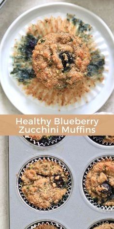 healthy blueberry zucchini muffins in a muffin tin on a white plate