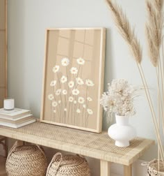 a wooden table topped with baskets and vases filled with flowers on top of it