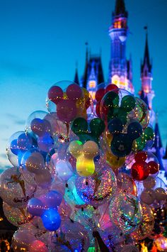 many balloons are in front of the castle