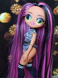 a doll with long purple hair and green eyes