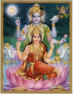 the hindu goddess sitting on top of a lotus flower with her hands clasped in front of her face