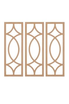 three wooden panels with decorative designs on them