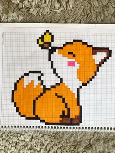 an image of a cross stitch pattern with a fox on it's back side