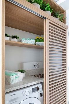 a washer and dryer in a small room