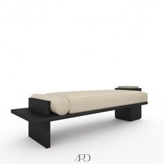 a black and white bench with a cushion on it