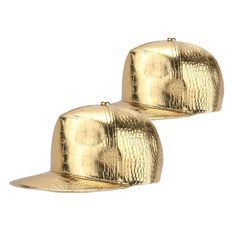 two gold hats are sitting side by side