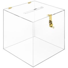 a clear box with gold handles on the front and side sides, it has a handle that is attached to the lid