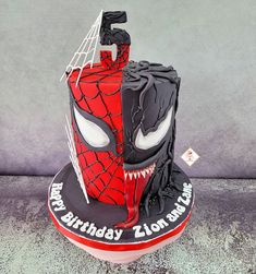 a spiderman birthday cake is on display for someone's special guests to celebrate