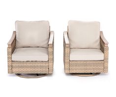 two chairs sitting next to each other on a white background