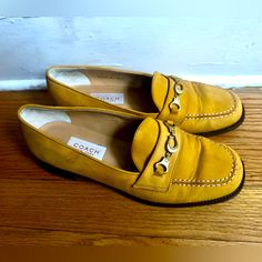 Vintage Italian Golden Yellow Coach Loafers, Gold Symbol. Women’s Size 7.5, Fits More Like A 7. Only Tried On, Unfortunately Didn’t Fit. Yellow Leather Loafers For Fall, Vintage Spring Loafers With Flat Heel, Vintage Flat Heel Loafers For Spring, Spring Vintage Loafers With Almond Toe, Coach Loafers For Spring Workwear, Yellow Flats With Flat Heel For Fall, Yellow Leather Flats With Almond Toe, Coach Leather Loafers For Spring, Yellow Leather Almond Toe Flats