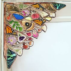 a close up of a butterfly decoration on a door