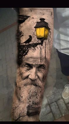 an old man with a lantern and birds on his head is shown in this tattoo